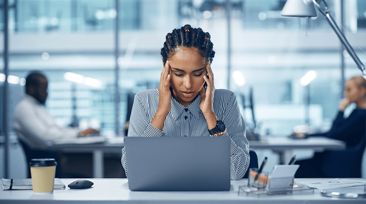 woman at desk mental health rheumatic disease